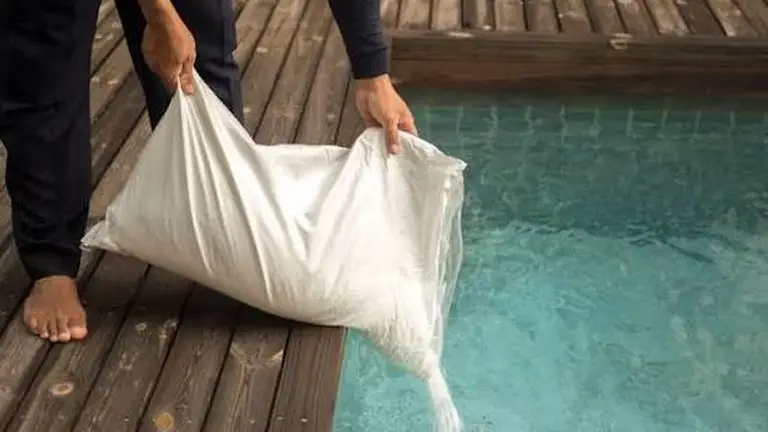 Adding pool salt during salt water pool maintenance after summer rain dilution in Atlanta GA